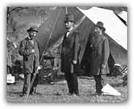 Lincoln near the front lines posing with top generals