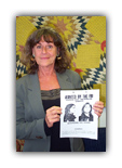 Bernadine Dohrn shows off her FBI wanted poster